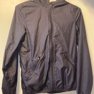 Ivivva, black zip up wind breaker.
